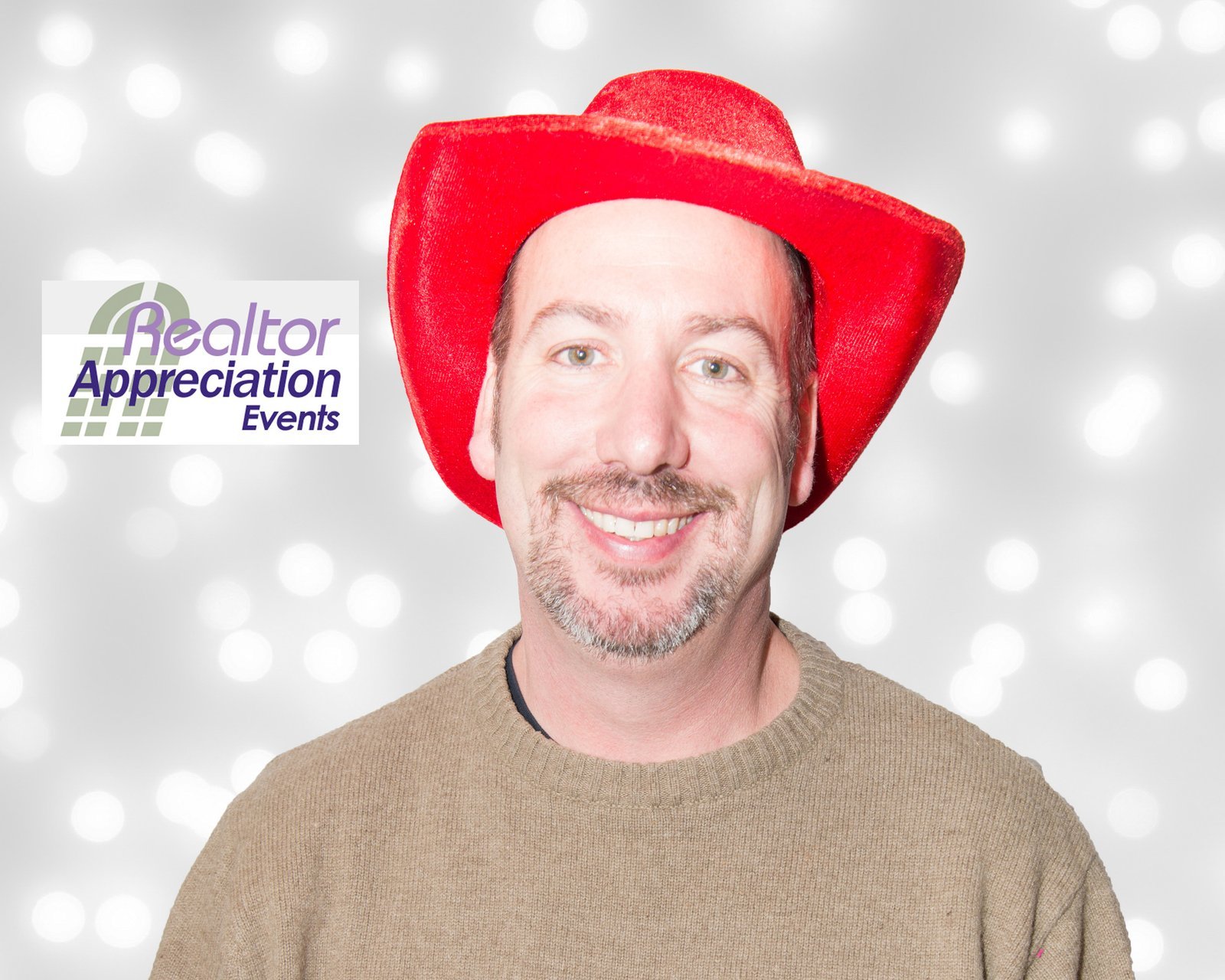 Guest wearing a red hat in the Realtor Appreciation Events photo archive