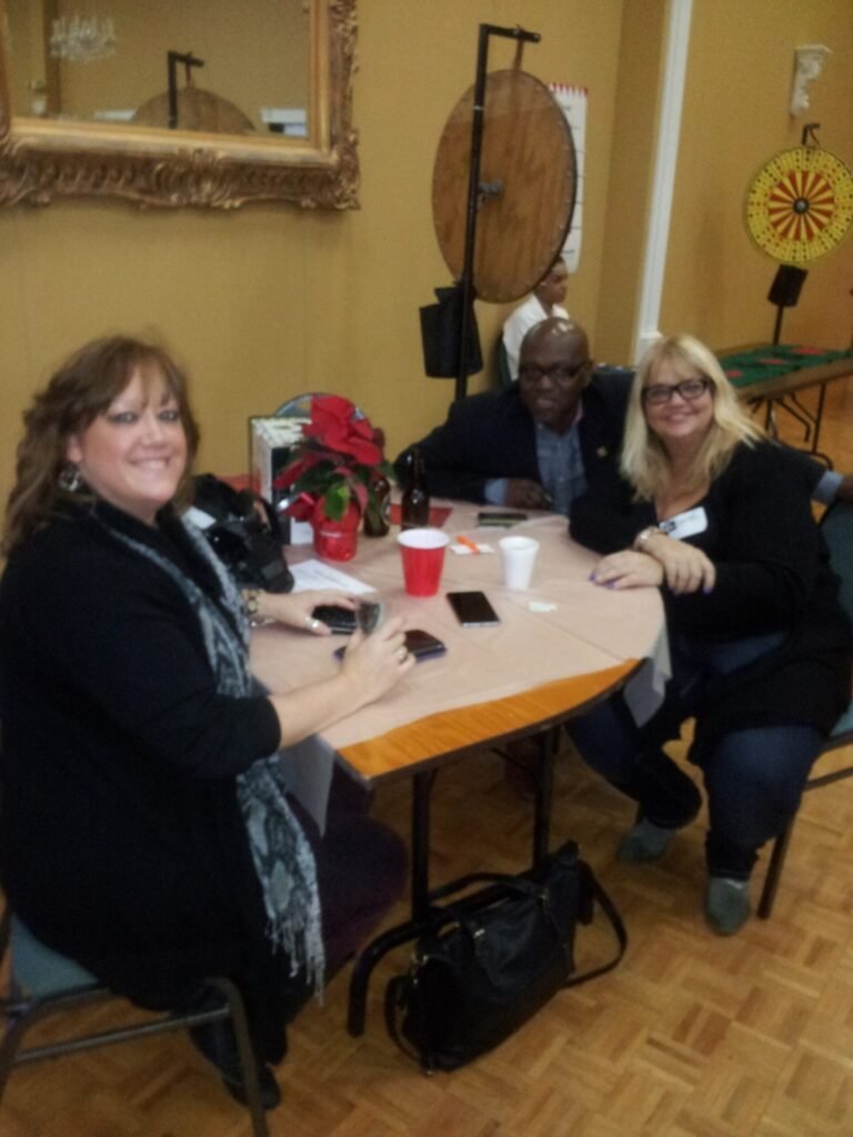 Guests seated together at a table at an archived event